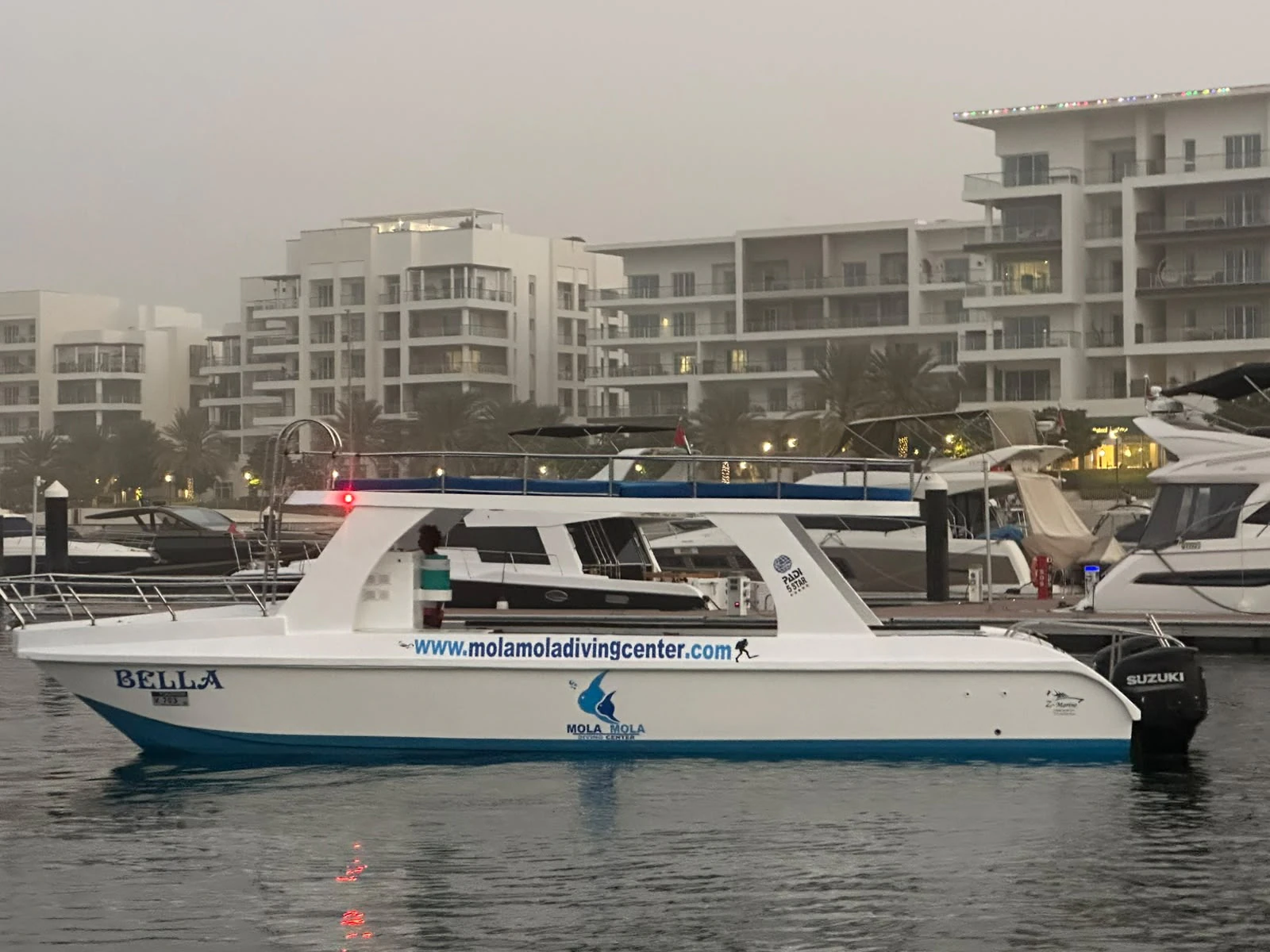 MolaMola catamaran in Al Mouj Marina