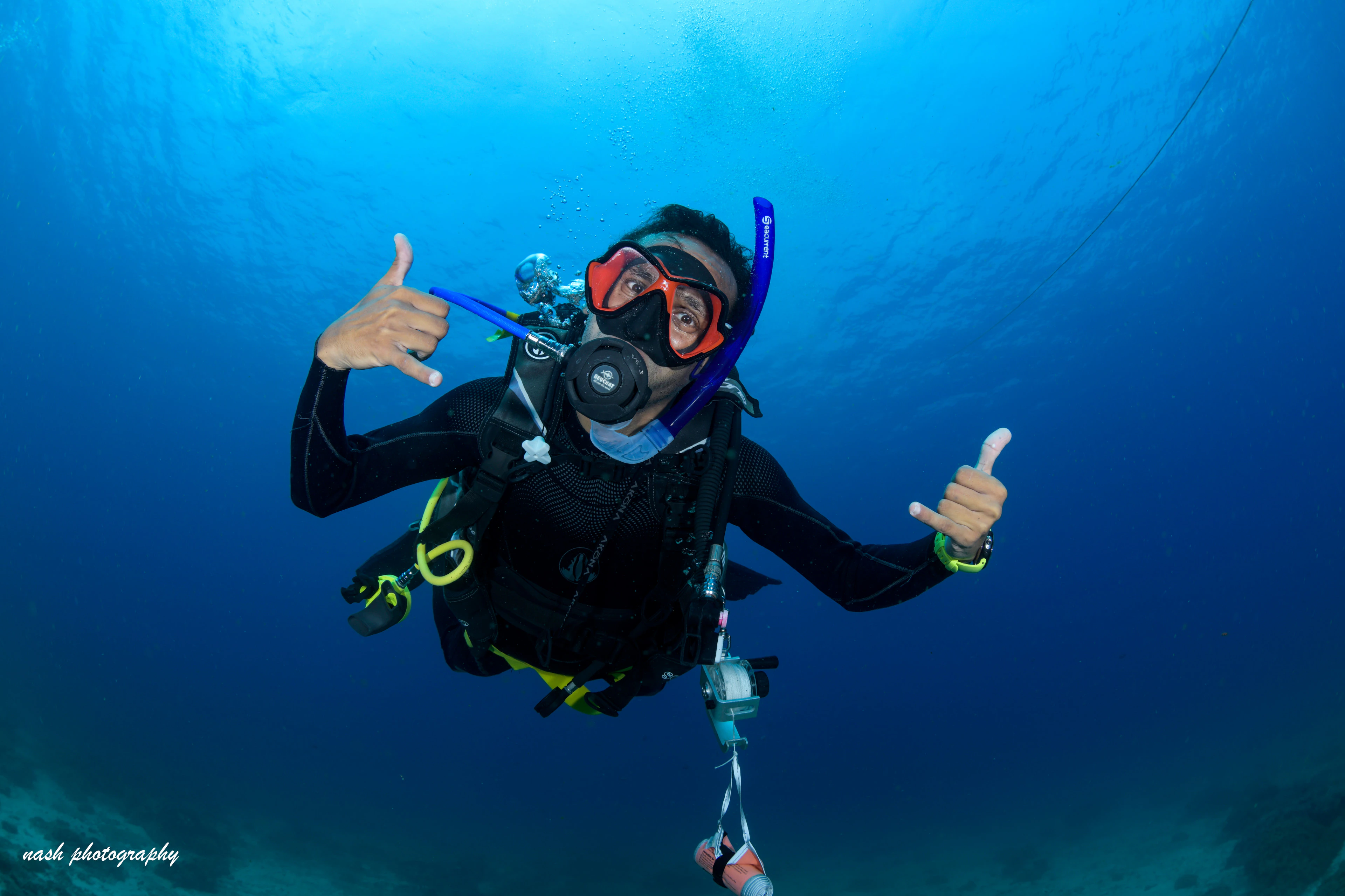 Diver giving a shaka sign
