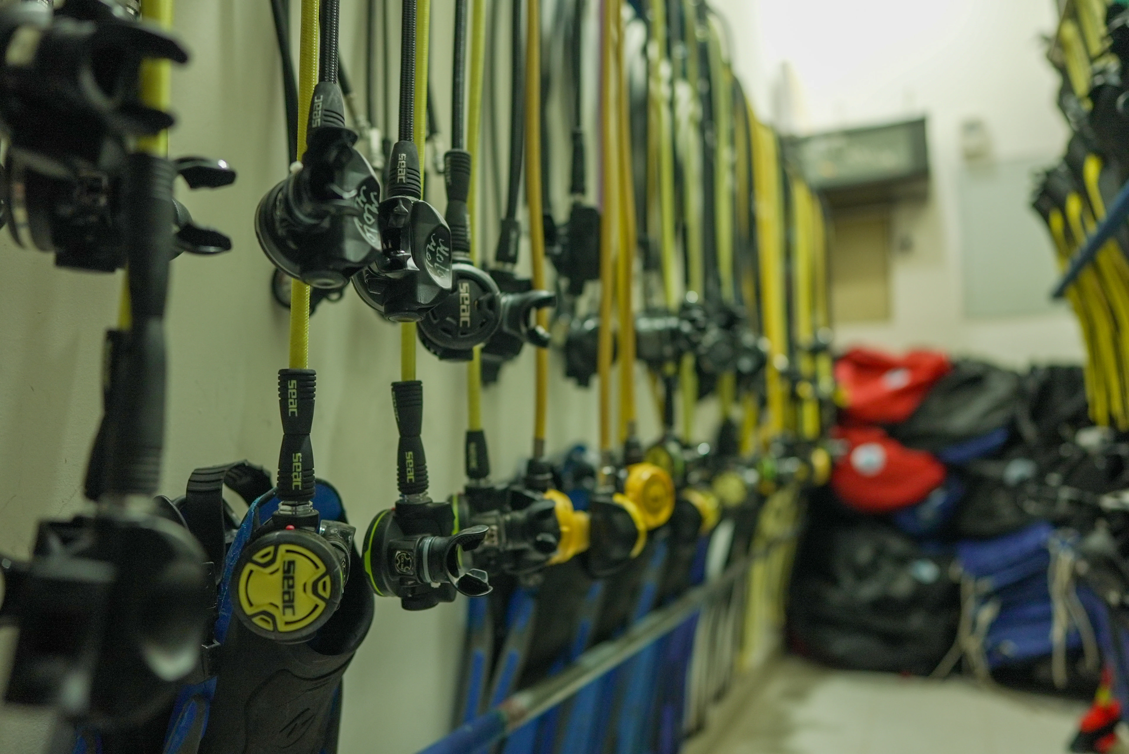 Rows of rental regulators in the gear room