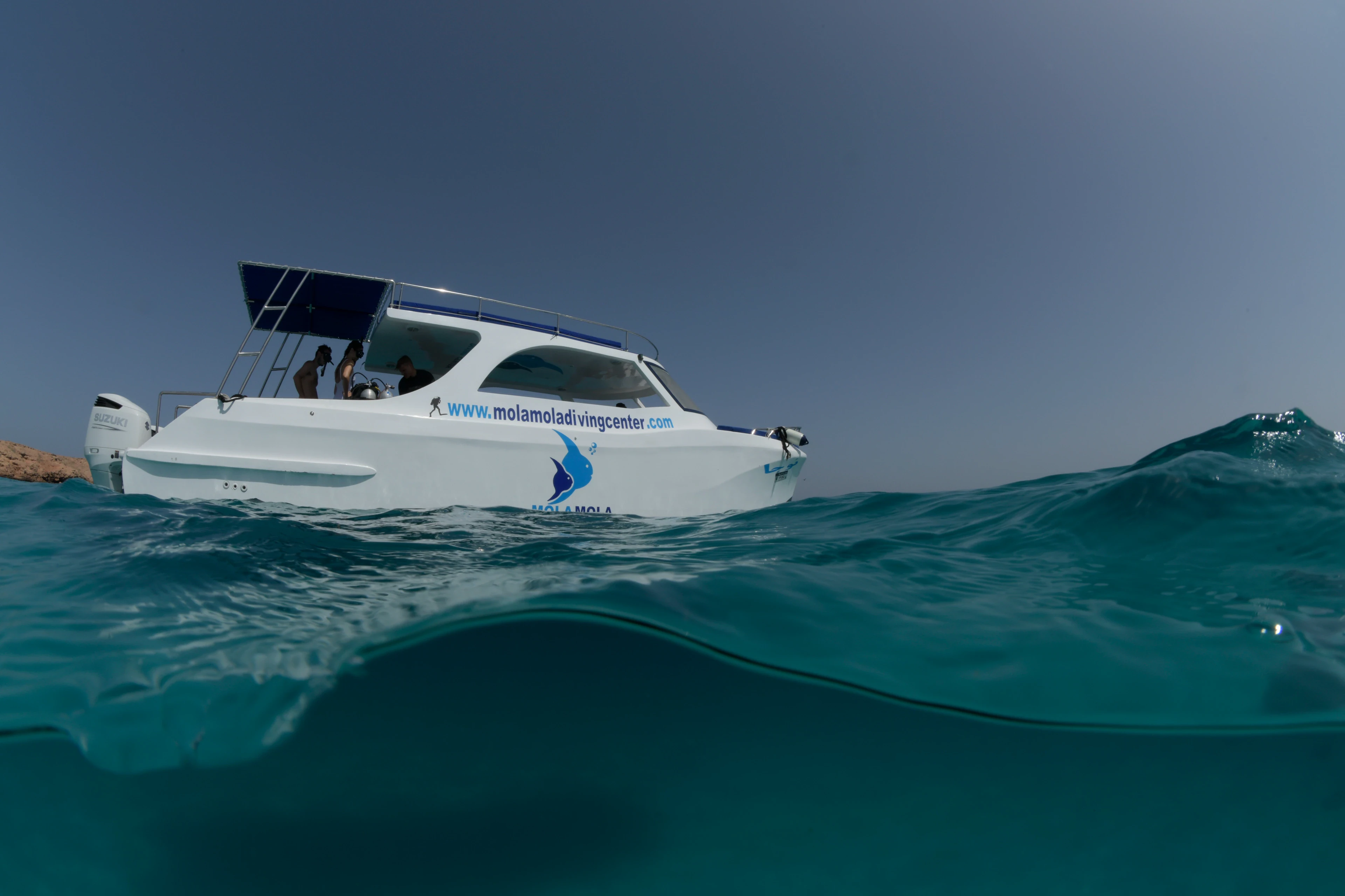 MolaMola dive boat riding the waves